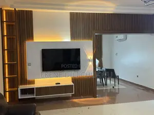 “Luxury Tv Wall Unit With Egger Wood Finish and Wooden Strip Design”
