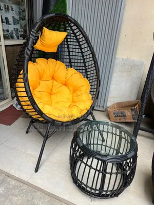 Quality Imported Unique Ratten Relaxing Chair and Side Stool