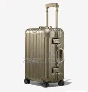 Rimowa 3-Size Spinner Luggage in Metallic Grey