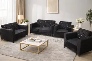 A Black 7 Seater Couch and Center Table