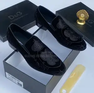 Prada and Versace Shoe