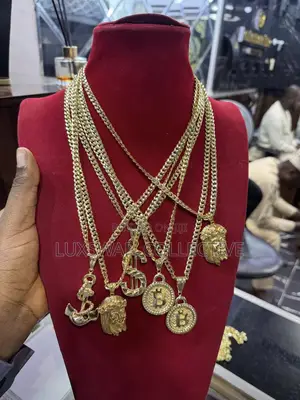 18-Karat Gold Cuban Chains and Pendants