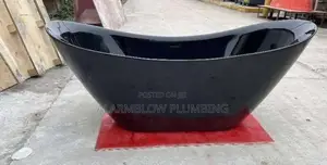 Black Acrylic Freestanding Bathtub With Curved, Double-Slipper Design