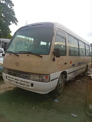 Toyota Coaster 2010 Gold