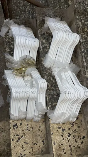 White Wooden Hangers With Golden Head