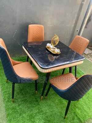 Classy Cushion Upholstered 4 Set Chairs With Sturdy Marble Table Set