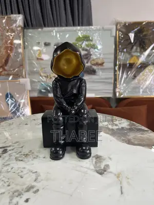 Sitting Astronaut Gold Black Figurine Decor