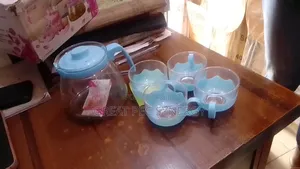 Tea Pot and 4 Glass Cups