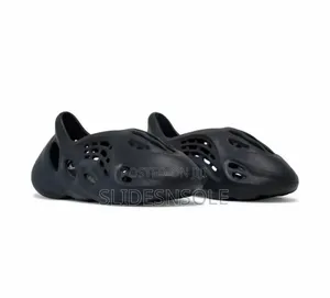 Adidas Yeezy Foam Runner. 
Given Its Solid Black Color, It Appears To