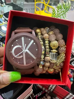 Ck Wristwatch and Bead Bangle With Box