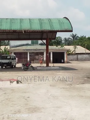 Filling Station With Block of Flats.