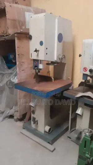 Industrial Vertical Band Saw Machine Used for Woodworking.