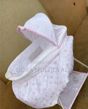 Delta Children Sweet Beginners Bassinet With Music and Lights