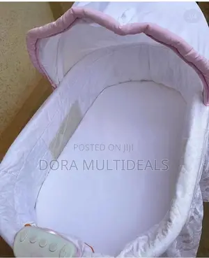 Delta Children Sweet Beginners Bassinet With Music and Lights