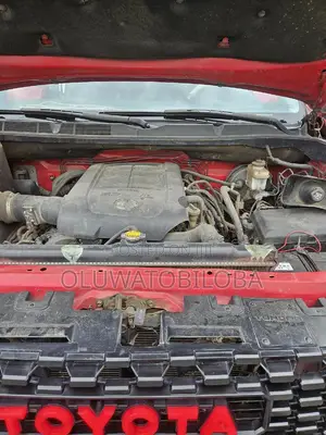 Toyota Tundra Limited 4dr Double Cab 4WD SB (5.7L 8cyl 6A) 2014 Red