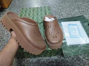 Gucci Gg Perforated Rubber Clogs – Authentic Designer Footwear