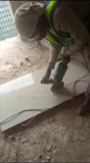 Profesional Tiles and Mable Services With a Satisfied Machine