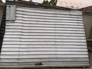 10 by 10 Feet Shop Container With an Iron Extension Bar