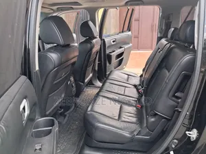 Honda Pilot Touring w/RES/Navi 4WD (3.5L 6cyl 5A) 2010 Black