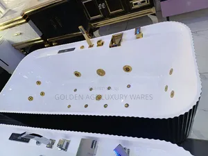 Luxury White and Black Jacuzzi With Gold Faucets