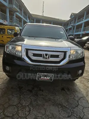 Honda Pilot Touring w/RES/Navi 4WD (3.5L 6cyl 5A) 2011 Black