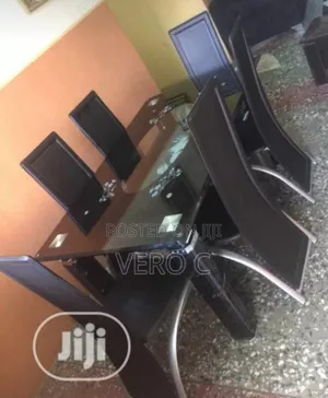 Super Quality Glass Dining Table and 6 Leather Chairs