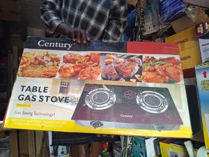 Century Table Top Has Cooker Glass