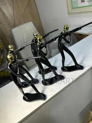 Gold Head Shooting Man Decor