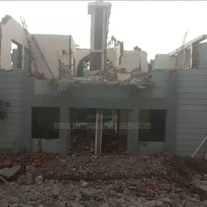Building Demolition: Excavator Hire, Jackhammer, Etc