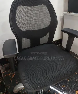 Comfortable Office Chair With Lumbar Support and Reclining Feature.