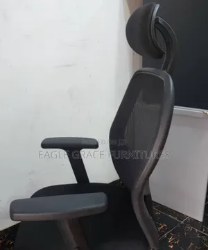 Durable Executive Chair With Ergonomic Design. Back Reclines