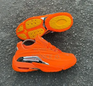 Luxury Orange  Drake Nocta Sneakers