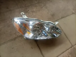 1 Set of Head Lamp Corolla 05