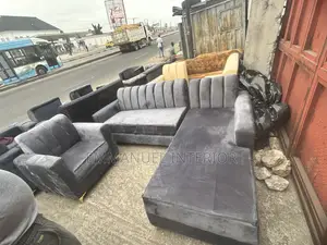 A Standard Soft Grey Parlor Couch