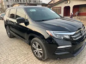 Honda Pilot Touring 4dr SUV 4WD (3.5L 6cyl 9A) 2017 Black