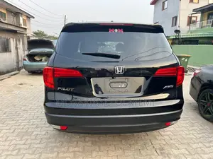 Honda Pilot Touring 4dr SUV 4WD (3.5L 6cyl 9A) 2017 Black
