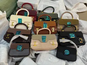 The B-Buzz 24 Tote and Shoulder Bags