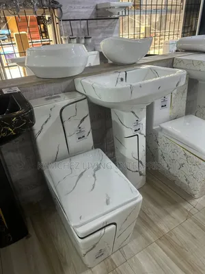 Marble-effect Bathroom – Toilet, Pedestal Sink & Designer Basins