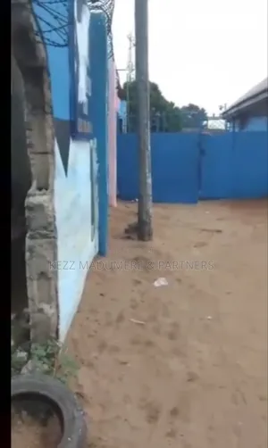 For Sale : Half (1⁄2) Plot With 3 Shops at Off Dr Peter Odili, Ph