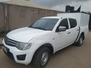 Mitsubishi L300 2014 White