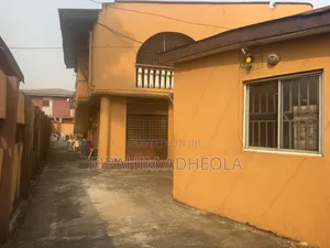 Land Measuring 1006sqm With Ademolishable Structure on It