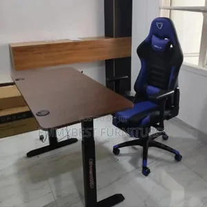 Adjustable Height Desk And Executive Leather Swivel Office Chair.