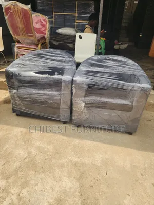 Grey Coloured Single Seater Chairs.