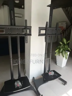 A Mobile, Rolling Led Tv Stand 55 to 75 Inches