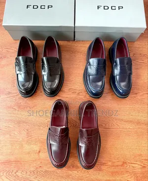 Emblem Cowhide Embossed Chunky Sole Loafers
