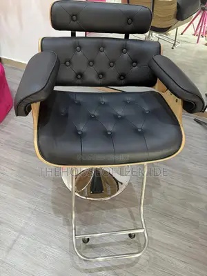 Trendy Saloon Chair With Wooden Design