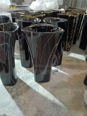 Unique Triangular Flower-Shaped Freestanding Wash Basin.