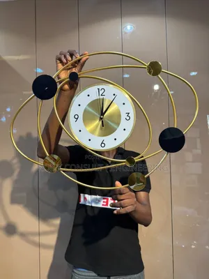 New in Golden Orbit Luxury Wall Clock . Material: Metal .
