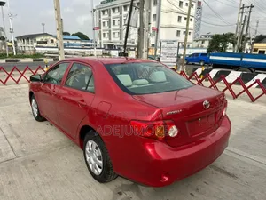Toyota Corolla LE 4dr Sedan (1.8L 4cyl 4A) 2010 Red