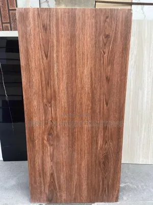 70 by 140 Quality Floor Tiles Sitting Room Matt Wood Finishing